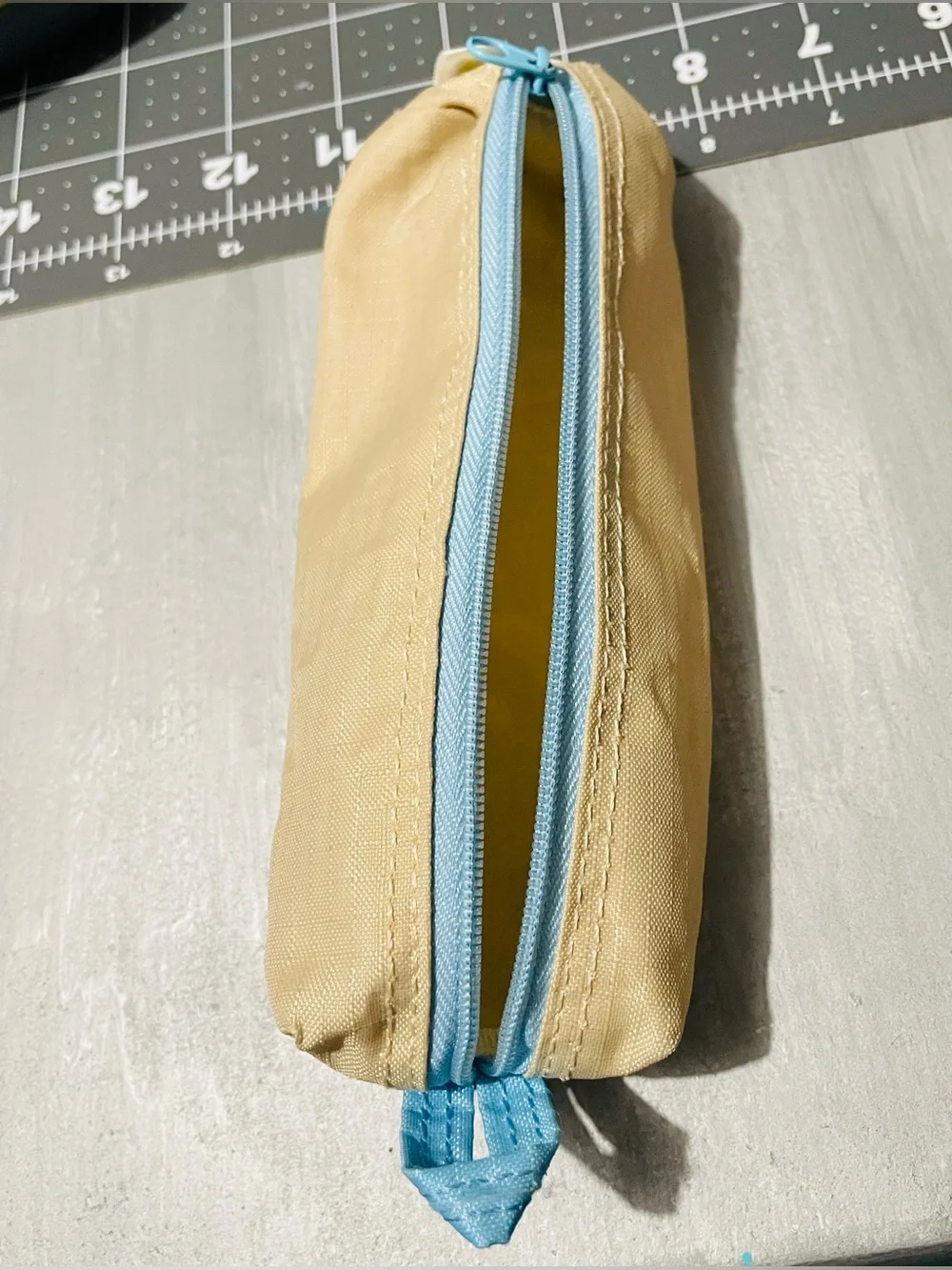 Ago Mong Beige Pencil Case with Orange and Blue Accents